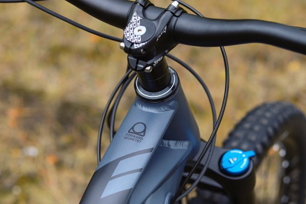 A angled shot from above showing part of the Top Tube, Stem, Handlebars and very top of the Front Forks on the Mondraker Crafty E Bike